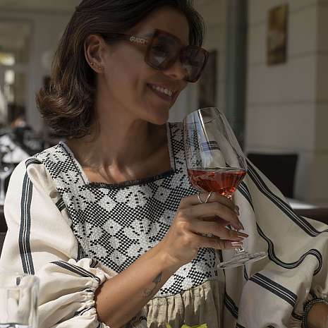 A person is eating in an elegant restaurant.